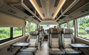 Interior mobil travel toyota hiace executive dengan reclining seat dan AC - raratravel.id